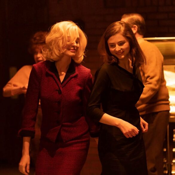 Anne Hathaway and Thomasin McKenzie cut a rug in 'Eileen'